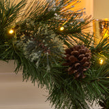 9-foot Mixed Spruce Pre-Lit Warm White LED Artificial Christmas Garland with Snowy Branches and Pinecones - NH493703